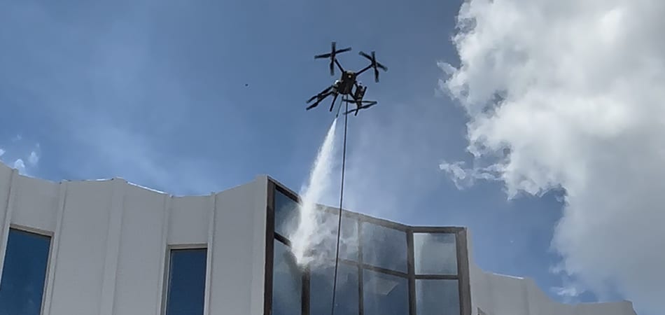 Drone washing hotel for fast, safe cleaning